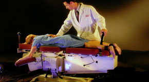 This is a picture of Cox Technic chiropratic spinal manipulation as performed at Wilson Family Chiropractic.